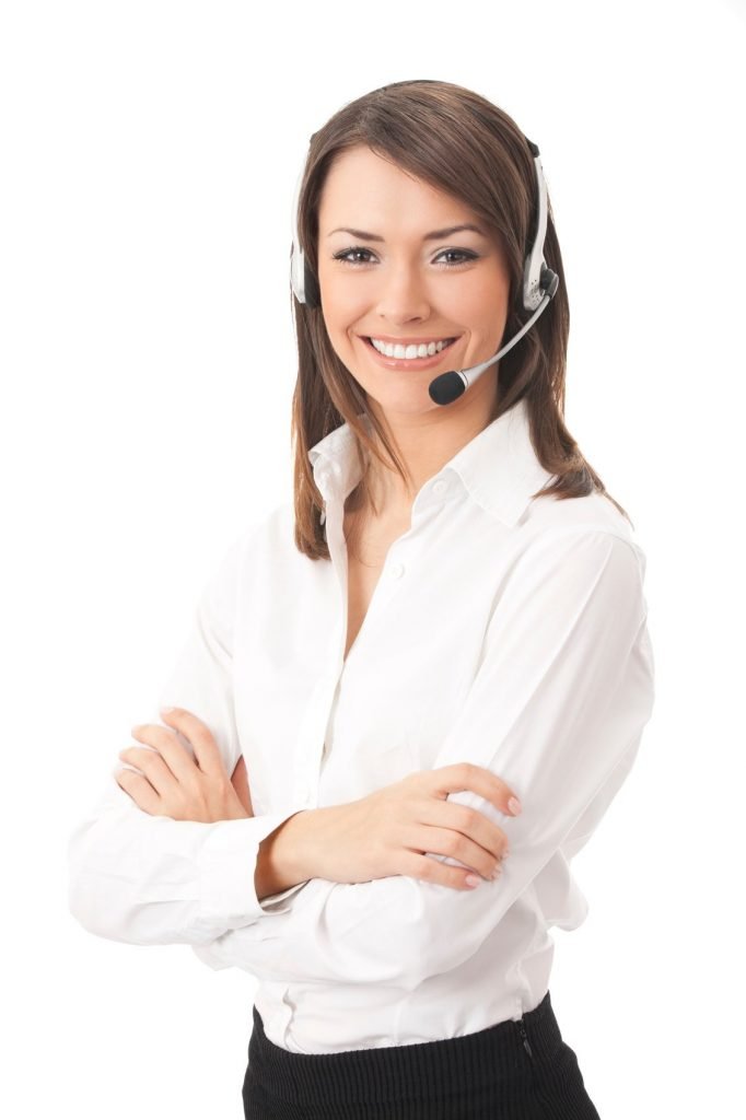 Women smiling while wearing a headset