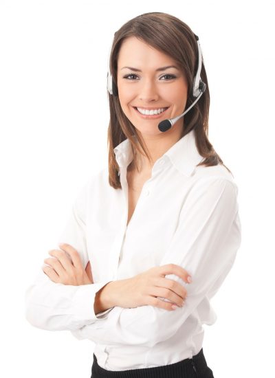 Women smiling while wearing a headset